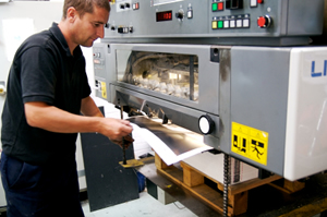 Man using full color printing equipment near Pawtucket, RI